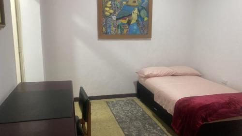 Katil atau katil-katil dalam bilik di Casa Prado Centro