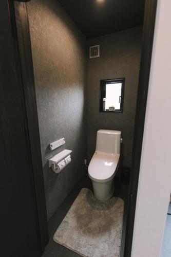 Koupelna v ubytování SAUNA&STAY MUNI 桜島