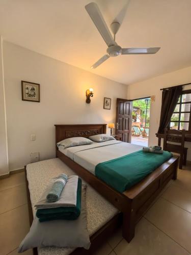 Ένα ή περισσότερα κρεβάτια σε δωμάτιο στο Camali Hotel