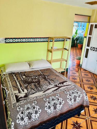 Katil atau katil-katil dalam bilik di Casa Argentina