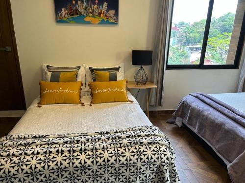 Postel nebo postele na pokoji v ubytování Casa Velódromo