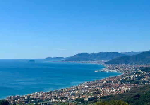 an aerial view of a city next to the ocean at Dimora Concept - Orizzonte Blu - Verezzi sea view in Borgio Verezzi