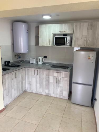 Köök või kööginurk majutusasutuses "Marenostro" Dpto #4, edificio frente al mar