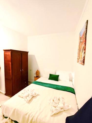 Postel nebo postele na pokoji v ubytování RIAD DAR ESSOURY Marrakech