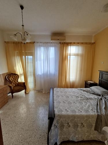 Ένα ή περισσότερα κρεβάτια σε δωμάτιο στο Ca`d' Alessio