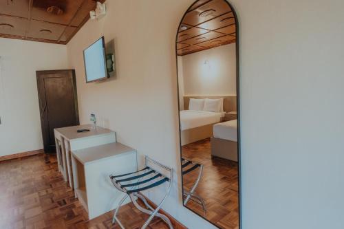 TV a/nebo společenská místnost v ubytování Hotel Boutique Rebequet