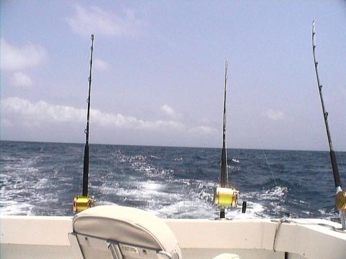 two fishing rods on the back of a boat at Short Walk to Beach 1 in South Padre Island