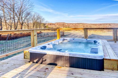 Фотография из галереи Picture Worthy Cabin with Hot Tub on 10 Private Acres в городе Sterling