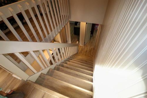 a view of a staircase in a house at Villa MiaNova A Modern Hideout in the Woods in Lake Ariel