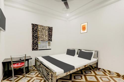 Μια τηλεόραση ή/και κέντρο ψυχαγωγίας στο Hotel O Relax Inn