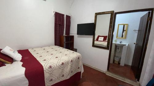Postel nebo postele na pokoji v ubytování Hotel Marjenny