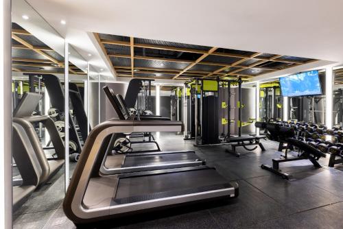 a gym with treadmills and cardio equipment in it at Atour X Hotel Beijing CBD International Trade Bridge in Beijing