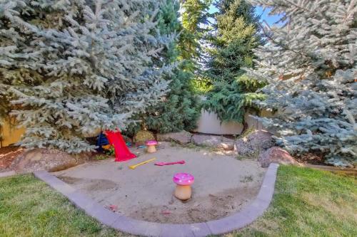 a pretend sandbox in a yard with trees at Entertainment Castle - Large Group & Company Func in Meridian