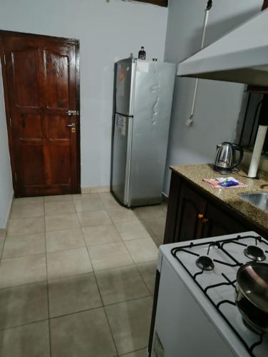 Kuchyň nebo kuchyňský kout v ubytování Departamentos omill 170
