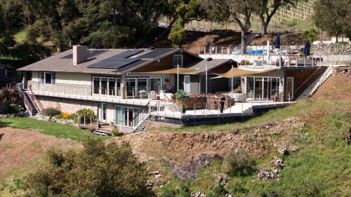 an aerial view of a house with solar panels on it at Montebello Views in Cupertino