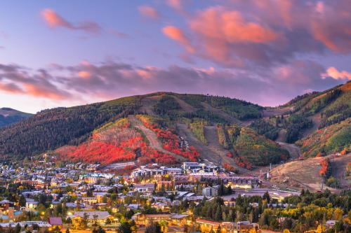 a town in the mountains with autumn foliage at Flying Moose at Helling Circle 101 condo in Heber City