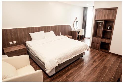 Ένα ή περισσότερα κρεβάτια σε δωμάτιο στο X9 Hotel Luxury