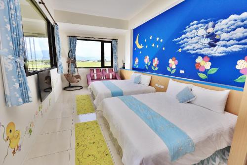 Postel nebo postele na pokoji v ubytování Dragonfly B&B