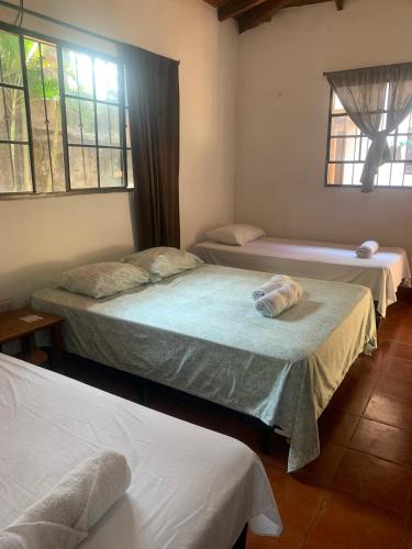 Katil atau katil-katil dalam bilik di Sunrise Guest House