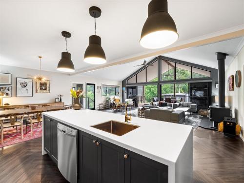 an open kitchen and living room with a counter top at Greenview in Margaret River Town
