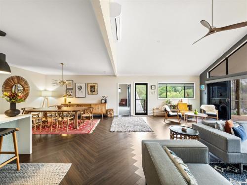 a living room with a couch and a table at Greenview in Margaret River Town