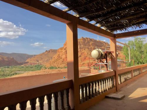 a balcony with a view of the mountains at Kasbah Alami in Kalaat MGouna