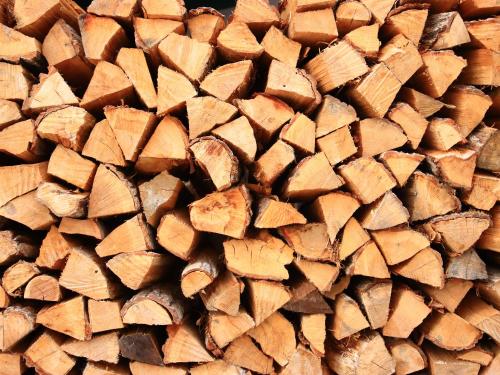 a pile of cut up wood is shown at Azumino Salon in Azumino