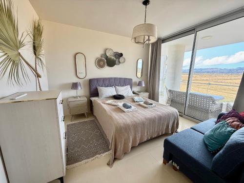 Postel nebo postele na pokoji v ubytování Sea view suites by the Coast