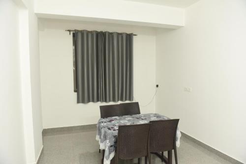 Posezení v ubytování Sai Homestay Panaji Goa Apartments