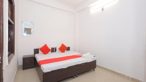 Ένα ή περισσότερα κρεβάτια σε δωμάτιο στο Hotel ZoVo Agra