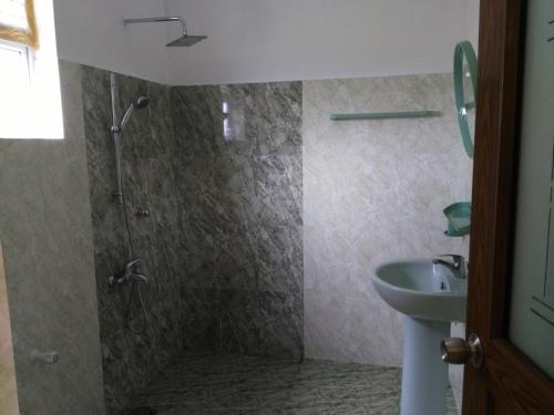 Koupelna v ubytování Sunrise Beach Inn