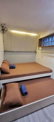 two bunk beds in a small room with at My Cabin by One Selah in Bustos