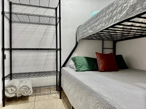 Postel nebo postele na pokoji v ubytování Brisa Amatista - Casa completa y centrica en San Ramón #1