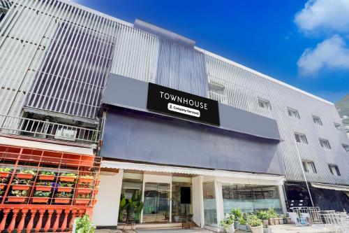 a front view of a townulse building at The Unicontinental in Mumbai