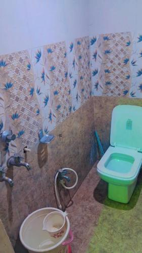 Et badeværelse på Lakshman Guest House Varanasi