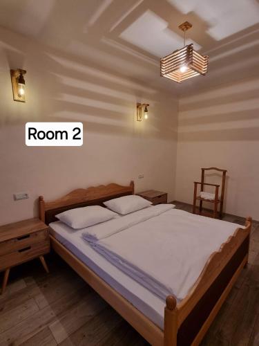 a bedroom with a bed with a room at New Horizons , villa with 5 bedrooms, whole apartment, апартмент целиком in Dilijan