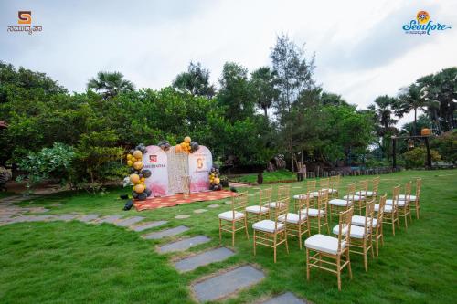 a set up for a wedding in a park at Samudyatha Sea Shore in Kōtatattu