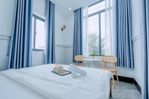 Katil atau katil-katil dalam bilik di Jayden Hotel - Phú Quý