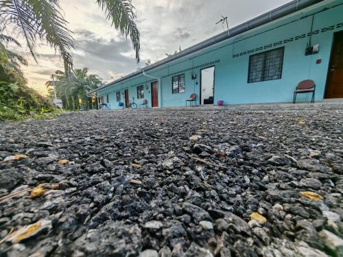 a pile of rocks in front of a building at HOMESTAY DATUL BANTING #6, 2bilik 5-7org, Near Kelanang, HargaB40, #NO TOWEL in Banting