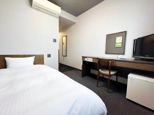 TV a/nebo společenská místnost v ubytování Hotel Route-Inn Kakamigahara