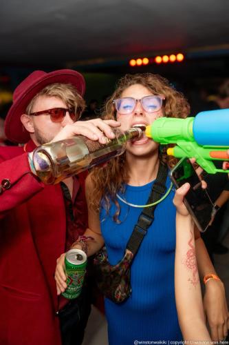 a woman holding a largepipe in her mouth at Mao's Party Experiment in Bogotá