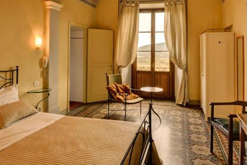 מיטה או מיטות בחדר ב-Albergo San Lorenzo