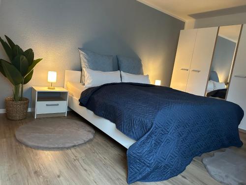 Voodi või voodid majutusasutuse Zentrales 2,5-Zimmer Apartment mit mega Bergblick toas