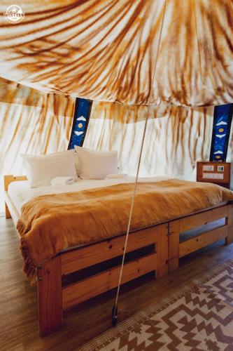 Letto o letti in una camera di Western Camp Resort