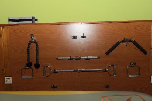 a wooden chest with a bunch of guns on it at La Casona De Entralgo in Pola de Laviana