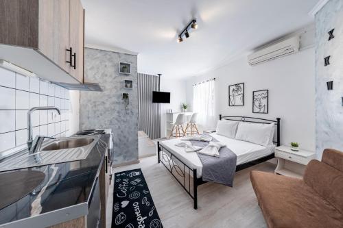 Giường trong phòng chung tại Utopia Central Studio