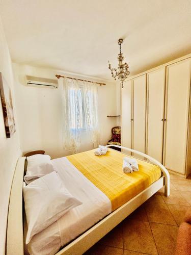Ένα ή περισσότερα κρεβάτια σε δωμάτιο στο Casa Valledoria