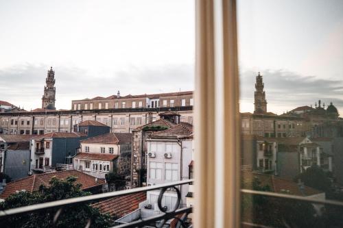 a view of a city from a window at GRANDE HOTEL PARIS by STAY HOTELS in Porto