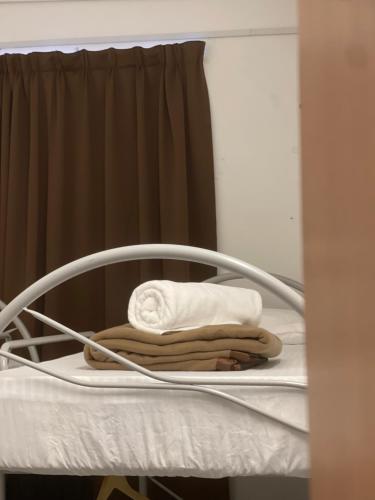 Ένα ή περισσότερα κρεβάτια σε δωμάτιο στο Heritage House 123