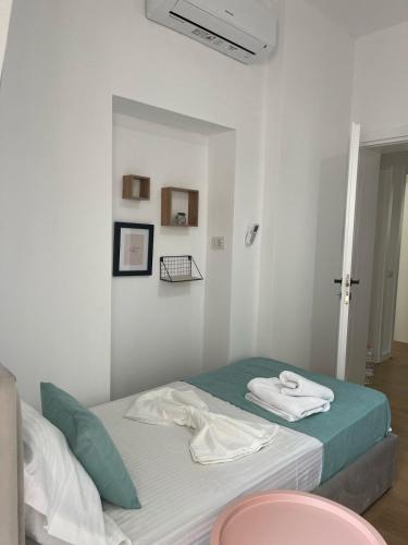 Postel nebo postele na pokoji v ubytování Cozy Apartment near Center